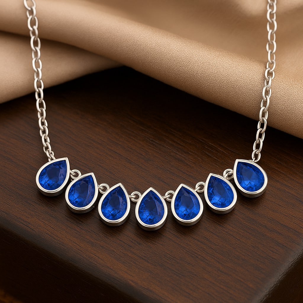 Natural Tanzanite Gemstone 92.5 Sterling Silver Necklace: Natural Tanzanite Gemstone 92.5 Sterling Silver Necklace Gemstone Shape : Pear Gemstone Size : 7x5 MM Gemstone Quantity : 1 Piece Metal : Silver Metal Purity : 92.5 Sterling Silver Pendant Leng