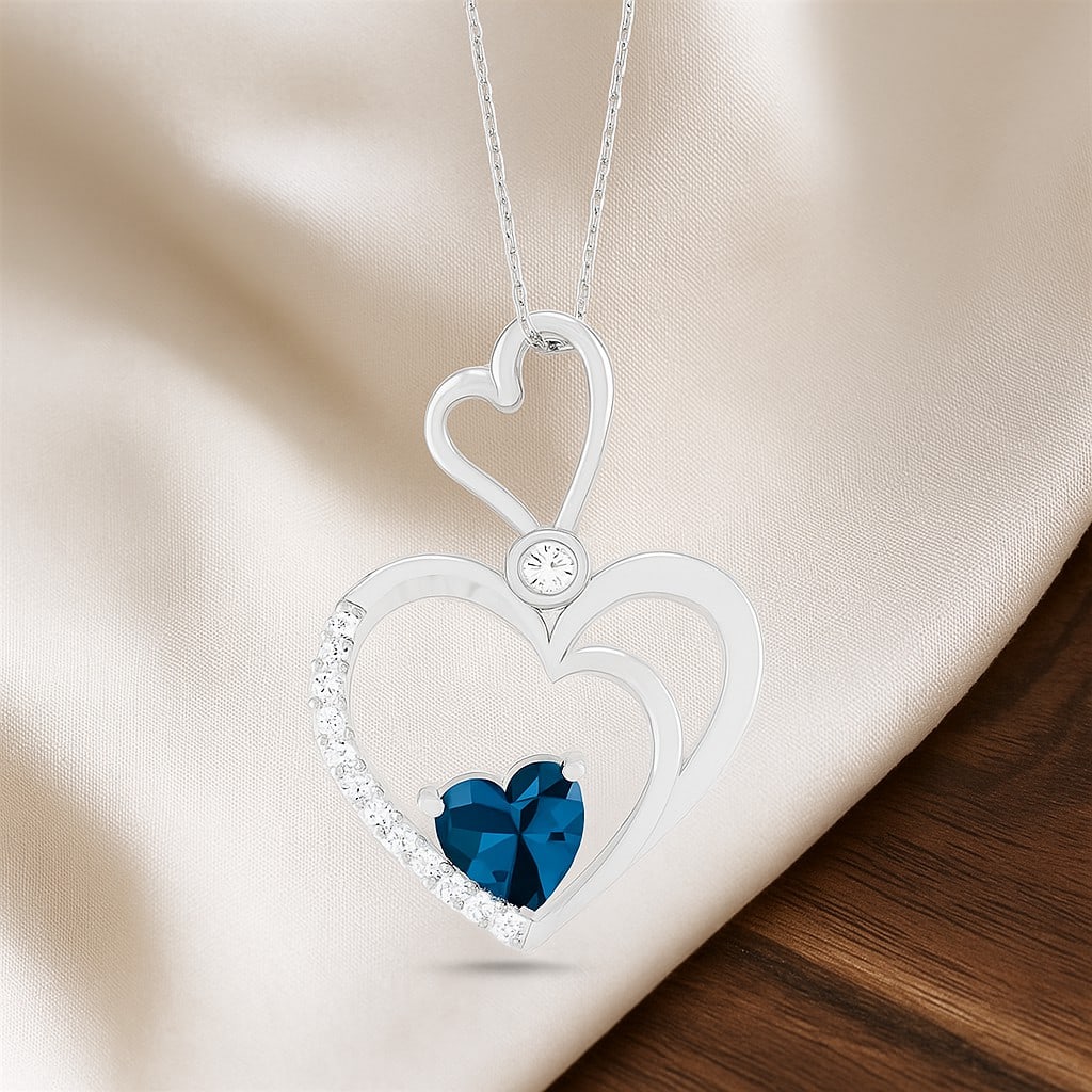 Natural London Blue Topaz & Diamond 92.5 Sterling Silver Pendant with Chain: Natural London Blue Topaz & Diamond 92.5 Sterling Silver Pendant with Chain Gemstone Shape : Heart Gemstone Size : 6 MM Gemstone Quantity : 1 Piece Diamond Type : Lab Grown Diamond Shape : Round