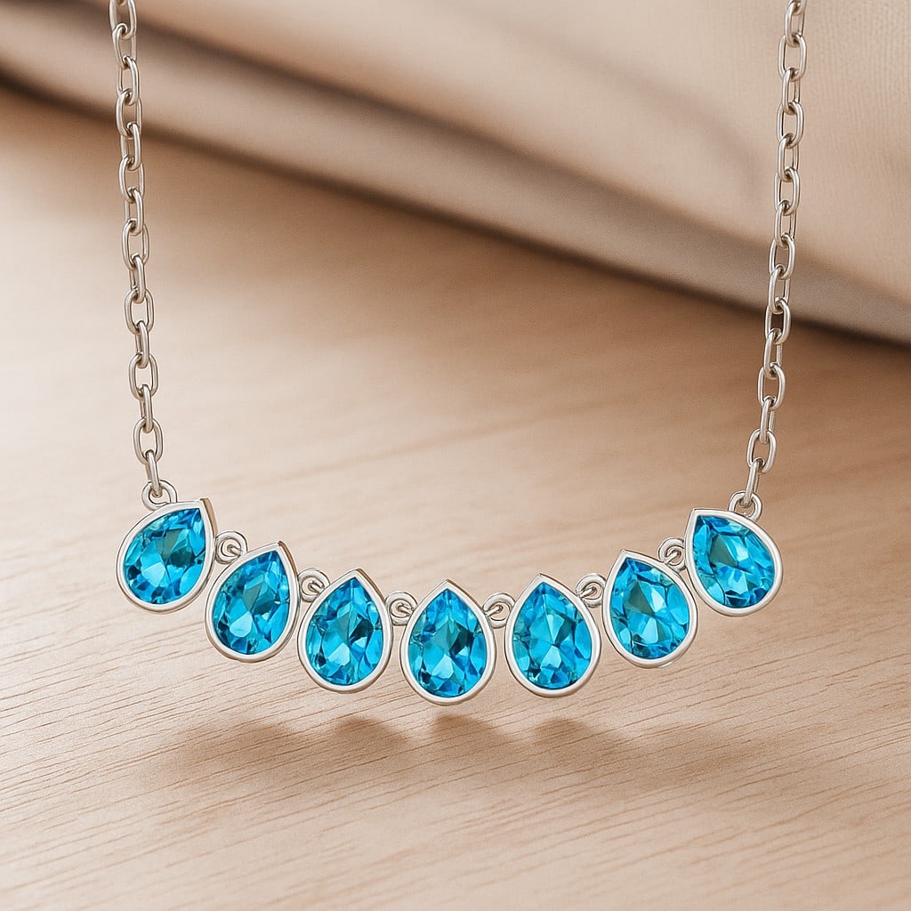 Natural Swiss Blue Topaz Gemstone 92.5 Sterling Silver Necklace: Natural Swiss Blue Topaz Gemstone 92.5 Sterling Silver Necklace Gemstone Shape : Pear Gemstone Size : 7x5 MM Gemstone Quantity : 1 Piece Metal : Silver Metal Purity : 92.5 Sterling Silver Penda