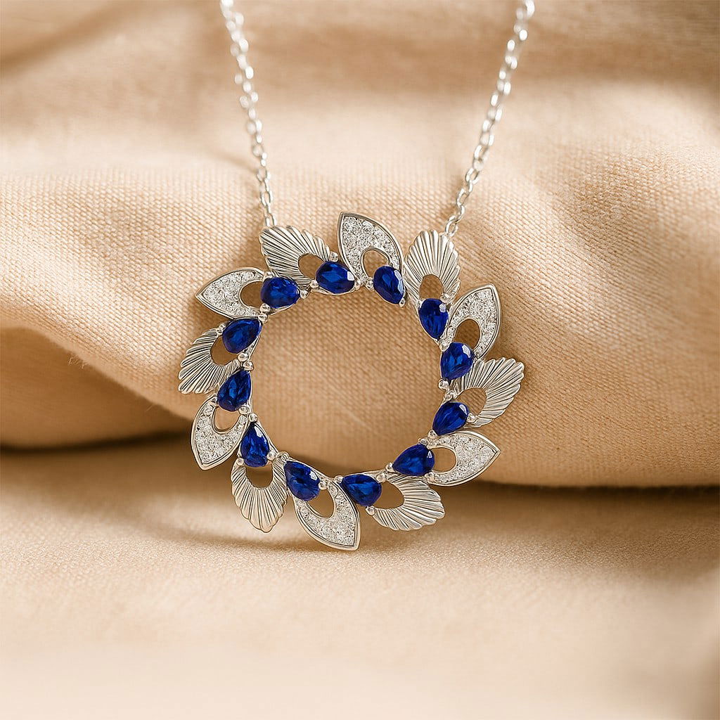 Natural Tanzanite & Diamond 92.5 Sterling Silver Pendant with Chain: Natural Tanzanite & Diamond 92.5 Sterling Silver Pendant with Chain Gemstone Shape : Pear Gemstone Size : 3x2 MM Gemstone Quantity : 12 Pieces Diamond Type : Lab Grown Diamond Shape : Round Dia