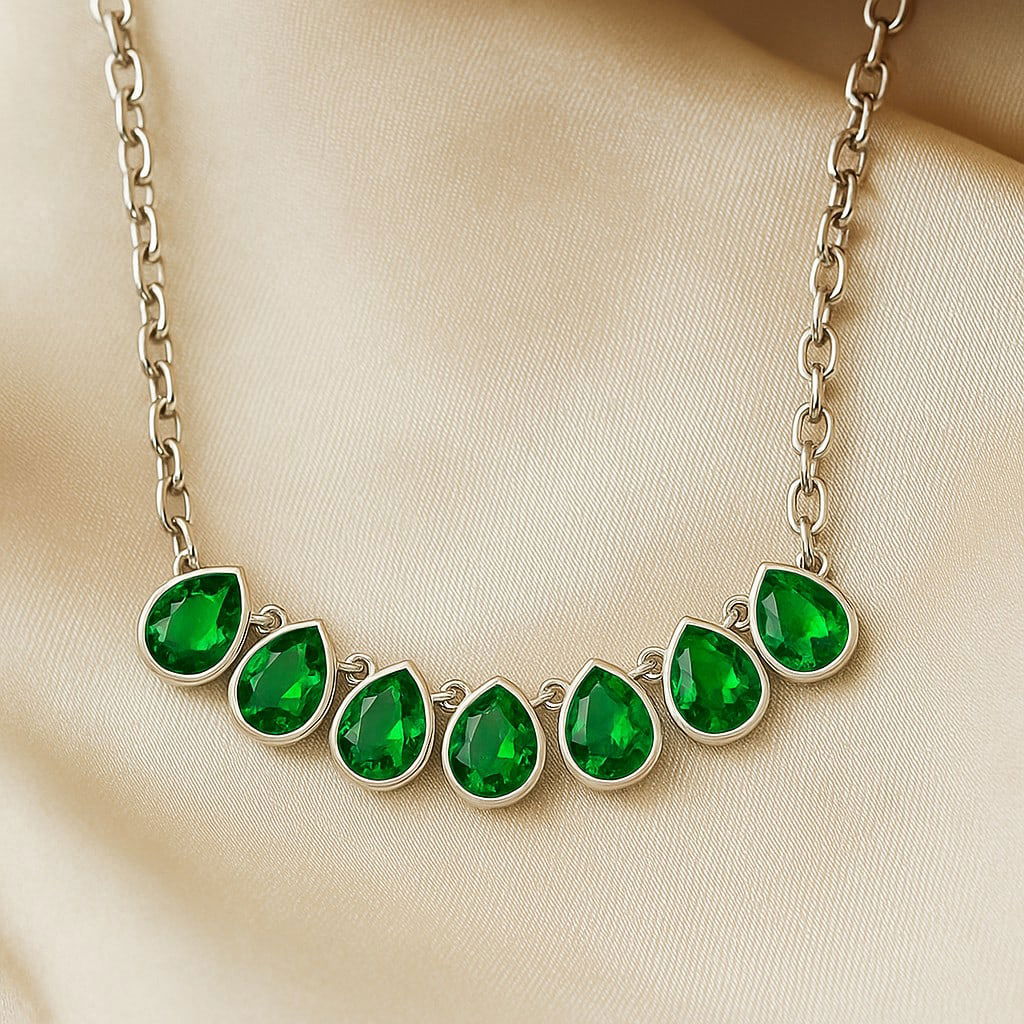 Lab Grown Emerald Gemstone 92.5 Sterling Silver Necklace: Lab Grown Emerald Gemstone 92.5 Sterling Silver Necklace Gemstone Shape : Pear Gemstone Size : 7x5 MM Gemstone Quantity : 1 Piece Metal : Silver Metal Purity : 92.5 Sterling Silver Pendant Leng
