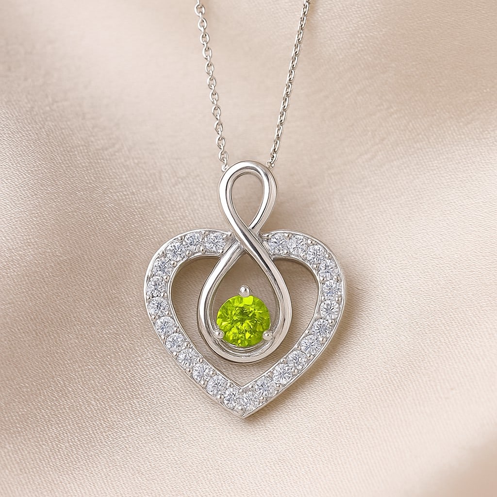 Natural Peridot & Diamond 92.5 Sterling Silver Pendant with Chain: Natural Peridot & Diamond 92.5 Sterling Silver Pendant with Chain Gemstone Shape : Round Gemstone Size : 3.5 MM Gemstone Quantity : 1 Piece Diamond Type : Lab Grown Diamond Shape : Round Diamon