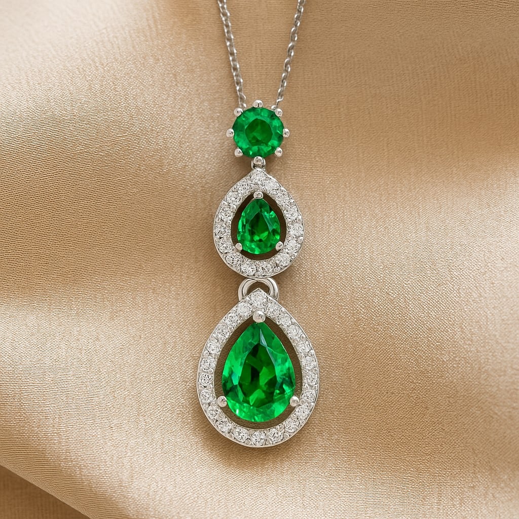 Lab Grown Emerald & Diamond 92.5 Sterling Silver Pendant with Chain: Lab Grown Emerald & Diamond 92.5 Sterling Silver Pendant with Chain Gemstone Shape : Pear, Round Gemstone Size : 7x5 MM, 4x3 MM, 3.5 MM Gemstone Quantity : 3 Pieces Diamond Type : Lab Grown Diamond Sh