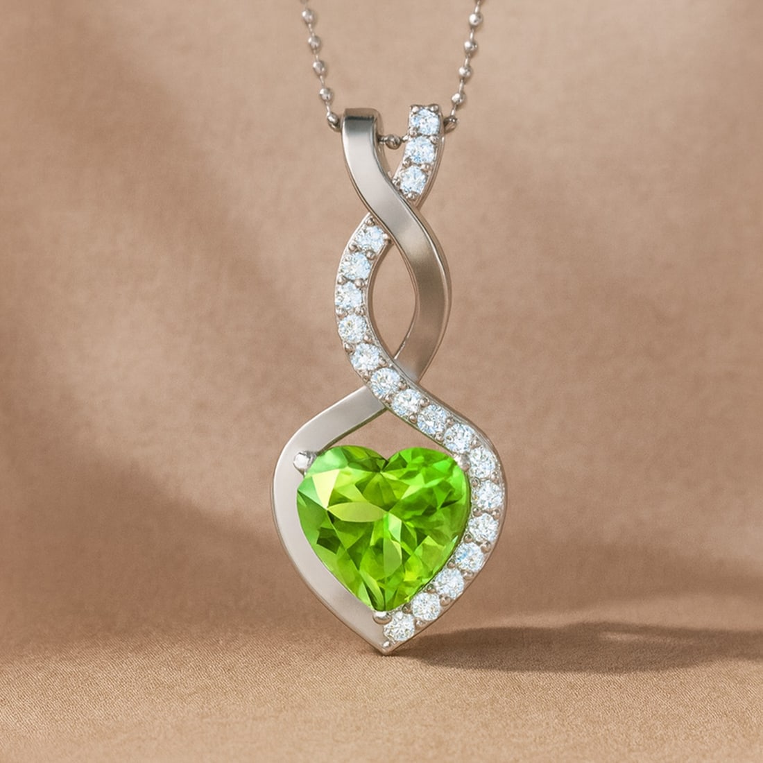 Natural Peridot & Diamond 92.5 Sterling Silver Pendant with Chain: Natural Peridot & Diamond 92.5 Sterling Silver Pendant with Chain Gemstone Shape : Heart Gemstone Size : 6 MM Gemstone Quantity : 1 Piece Diamond Type : Lab Grown Diamond Shape : Round Diamond