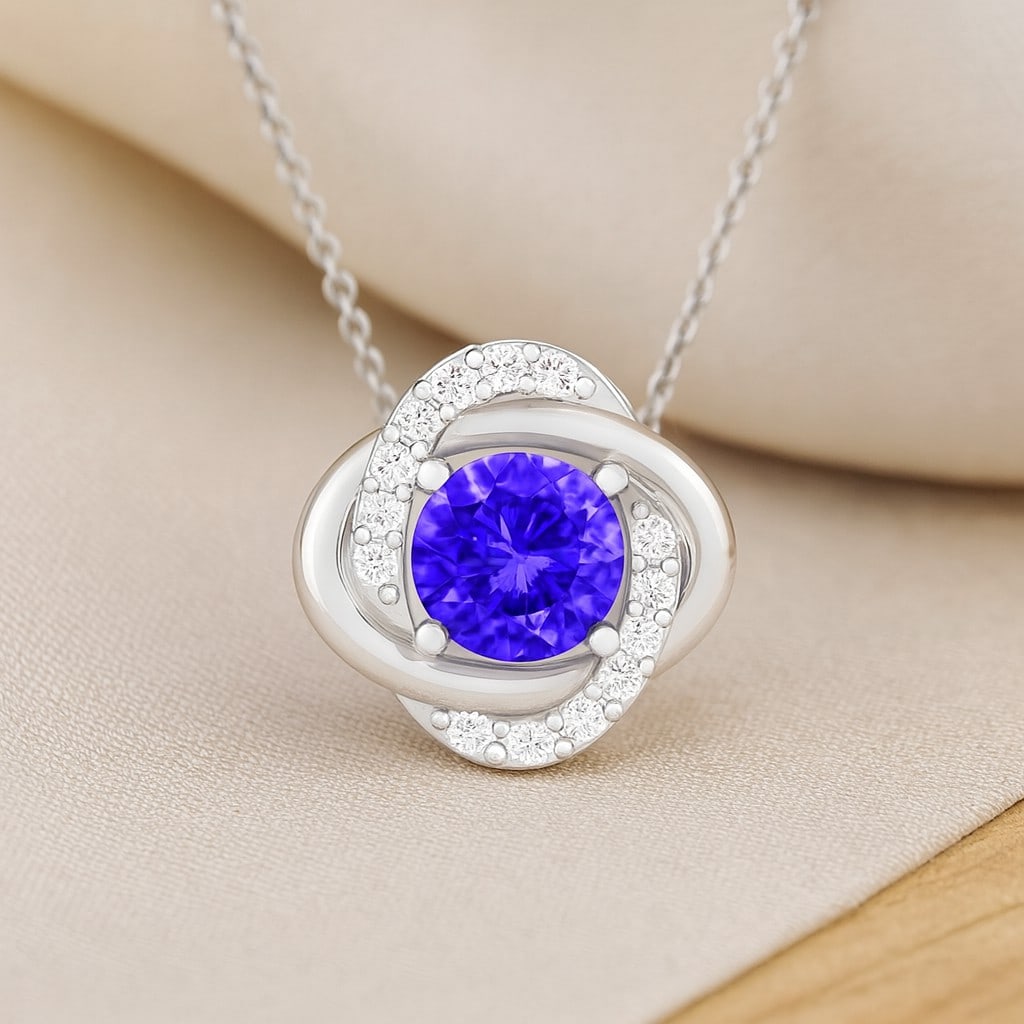Natural Tanzanite & Diamond 92.5 Sterling Silver Necklace: Natural Tanzanite & Diamond 92.5 Sterling Silver Necklace Gemstone Shape : Round Gemstone Size : 6 MM Gemstone Quantity : 1 Piece Diamond Type : Lab Grown Diamond Shape : Round Diamond Color :