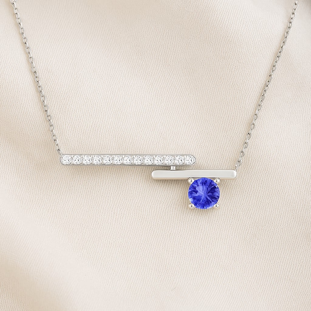 Natural Tanzanite & Diamond 92.5 Sterling Silver Necklace: Natural Tanzanite & Diamond 92.5 Sterling Silver Necklace Gemstone Shape : Round Gemstone Size : 3.5 MM Gemstone Quantity : 1 Piece Diamond Type : Lab Grown Diamond Shape : Round Diamond Color