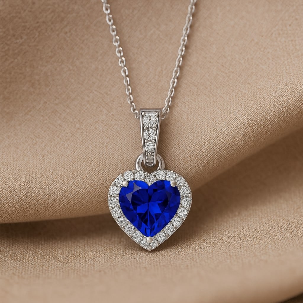 Natural Blue Sapphire & Diamond 92.5 Sterling Silver Pendant with Chain: Natural Blue Sapphire & Diamond 92.5 Sterling Silver Pendant with Chain Gemstone Shape : Heart Gemstone Size : 6 MM Gemstone Quantity : 1 Piece Diamond Type : Lab Grown Diamond Shape : Round Di