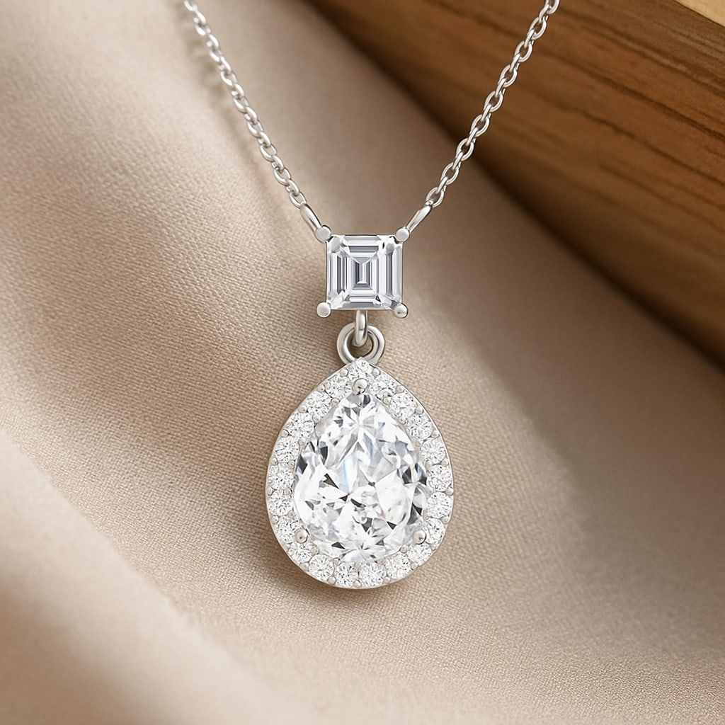 Lab Grown Diamond 92.5 Sterling Silver Pendant with Chain: Lab Grown Diamond 92.5 Sterling Silver Pendant with Chain Gemstone Shape : Pear, Princess Gemstone Size : 9x7MM, 1 MM Gemstone Quantity : 2 Pieces Diamond Type : Lab Grown Diamond Shape : Round