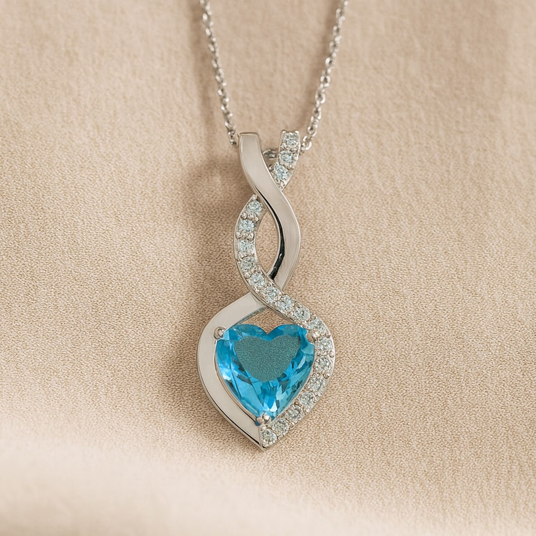Natural Swiss Blue Topaz & Diamond 92.5 Sterling Silver Pendant with Chain: Natural Swiss Blue Topaz & Diamond 92.5 Sterling Silver Pendant with Chain Gemstone Shape : Heart Gemstone Size : 6 MM Gemstone Quantity : 1 Piece Diamond Type : Lab Grown Diamond Shape : Round