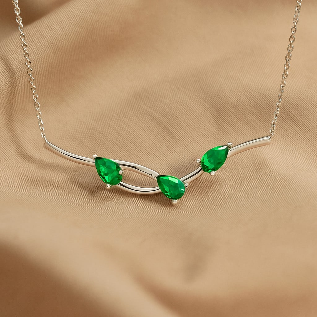 Lab Grown Emerald Gemstone 92.5 Sterling Silver Necklace: Lab Grown Emerald Gemstone 92.5 Sterling Silver Necklace Gemstone Shape : Pear Gemstone Size : 3 MM Gemstone Quantity : 3 Pieces Metal : Silver Metal Purity : 92.5 Sterling Silver Pendant Lengt