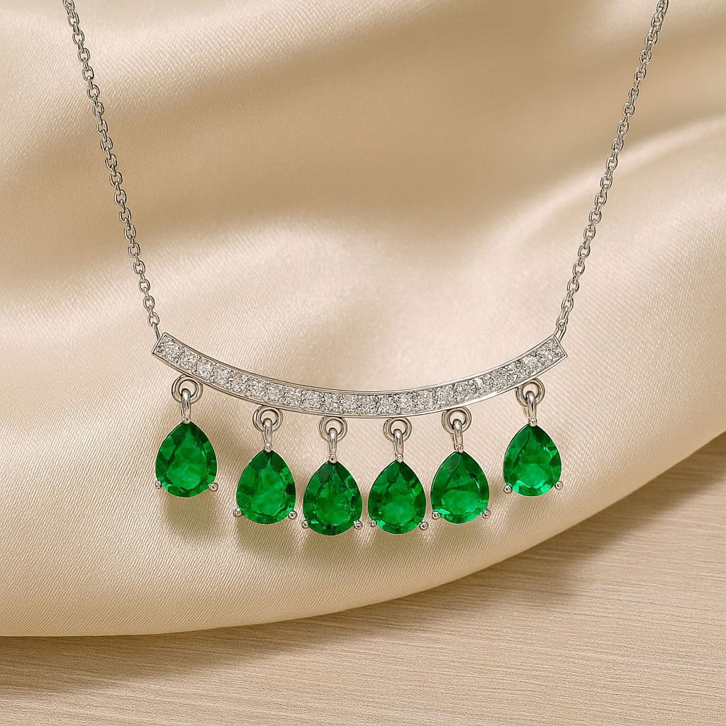 Lab Grown Emerald & Diamond 92.5 Sterling Silver Necklace: Lab Grown Emerald & Diamond 92.5 Sterling Silver Necklace Gemstone Shape : Pear Gemstone Size : 5x4 MM Gemstone Quantity : 6 Pieces Diamond Type : Lab Grown Diamond Shape : Round Diamond Color