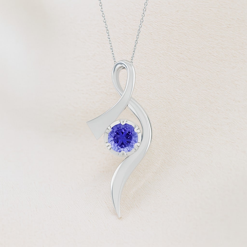 Natural Tanzanite Gemstone 92.5 Sterling Silver Pendant with Chain: Natural Tanzanite Gemstone 92.5 Sterling Silver Pendant with Chain Gemstone Shape : Round Gemstone Size : 6.00 MM Gemstone Quantity : 1 Piece Metal : Silver Metal Purity : 92.5 Sterling Silver