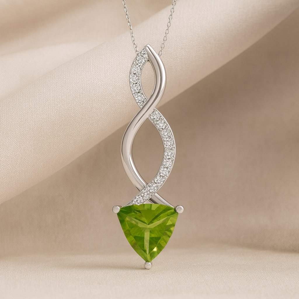 Natural Peridot & Diamond 92.5 Sterling Silver Pendant with Chain: Natural Peridot & Diamond 92.5 Sterling Silver Pendant with Chain Gemstone Shape : Trillion Curved Gemstone Size : 7 MM Gemstone Quantity : 1 Piece Diamond Type : Lab Grown Diamond Shape : Round