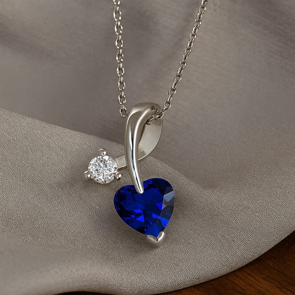 Natural Blue Sapphire & Diamond 92.5 Sterling Silver Pendant with Chain: Natural Blue Sapphire & Diamond 92.5 Sterling Silver Pendant with Chain Gemstone Shape : Heart Gemstone Size : 4 MM Gemstone Quantity : 1 Piece Diamond Type : Lab Grown Diamond Shape : Round Di