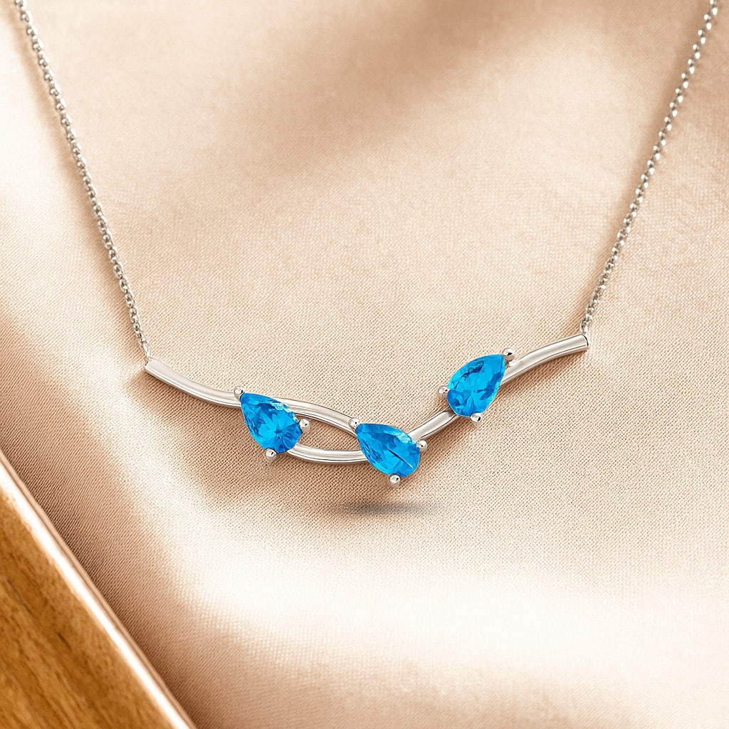 Natural Swiss Blue Topaz Gemstone 92.5 Sterling Silver Necklace: Natural Swiss Blue Topaz Gemstone 92.5 Sterling Silver Necklace Gemstone Shape : Pear Gemstone Size : 3 MM Gemstone Quantity : 3 Pieces Metal : Silver Metal Purity : 92.5 Sterling Silver Pendan