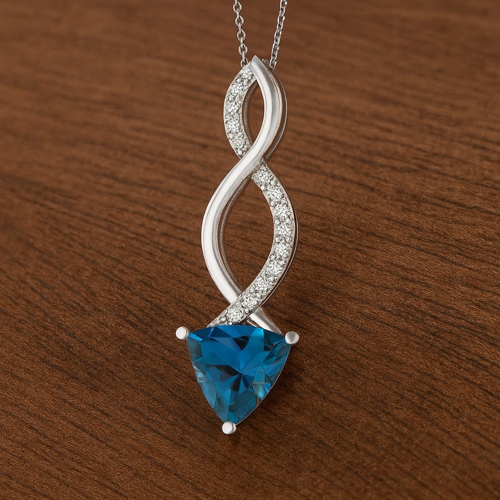 Natural London Blue Topaz & Diamond 92.5 Sterling Silver Pendant with Chain: Natural London Blue Topaz & Diamond 92.5 Sterling Silver Pendant with Chain Gemstone Shape : Trillion Curved Gemstone Size : 7 MM Gemstone Quantity : 1 Piece Diamond Type : Lab Grown Diamond Shape : R
