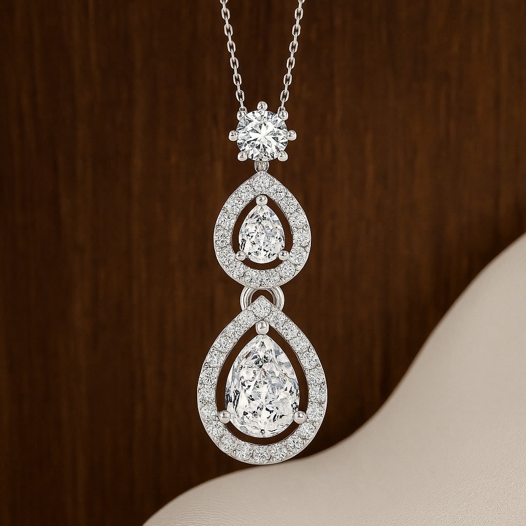 Lab Grown Diamond 92.5 Sterling Silver Pendant with Chain: Lab Grown Diamond 92.5 Sterling Silver Pendant with Chain Gemstone Shape : Pear, Round Gemstone Size : 7x5 MM, 4x3 MM, 3.5 MM Gemstone Quantity : 3 Pieces Diamond Type : Lab Grown Diamond Shape : Roun