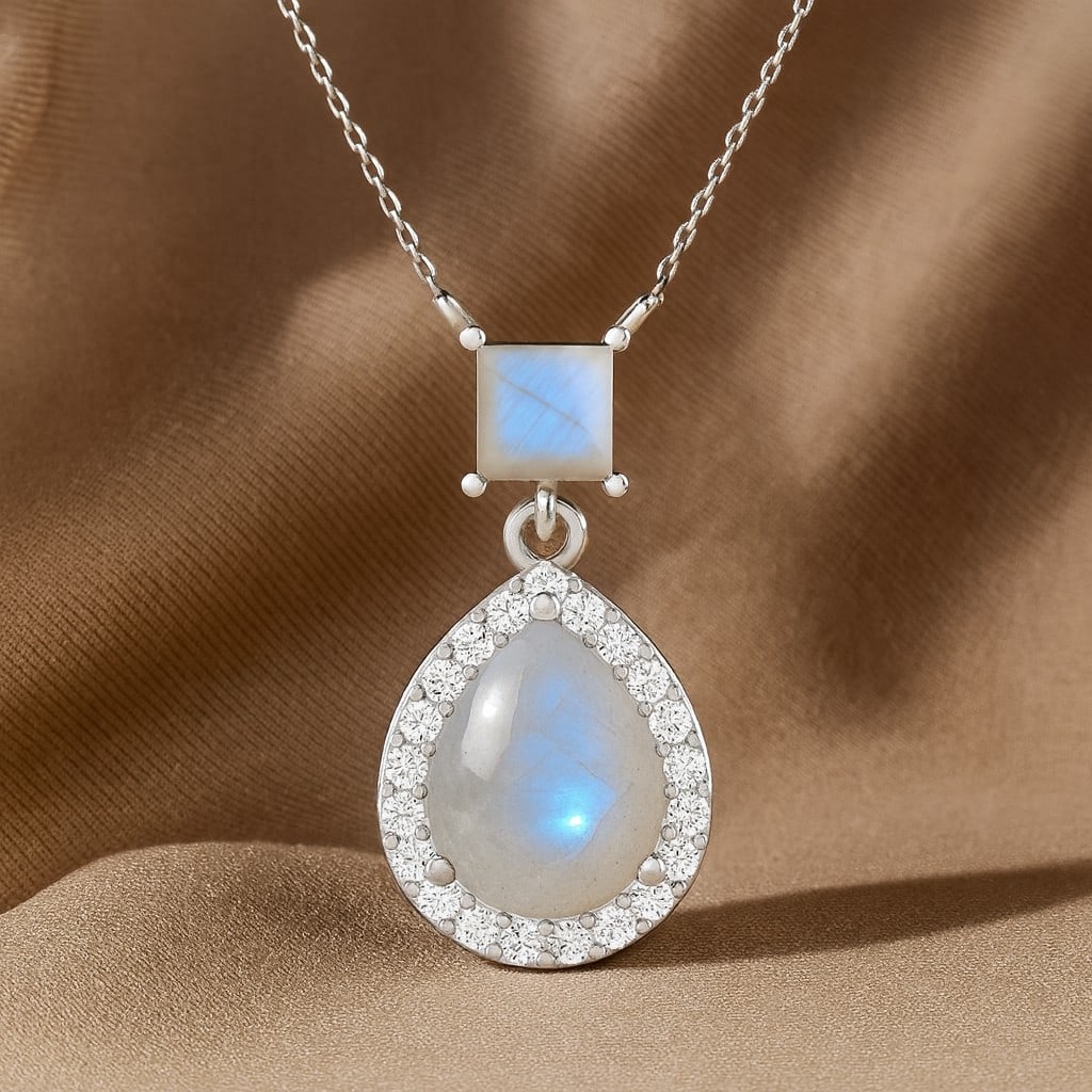 Natural Moonstone & Diamond 92.5 Sterling Silver Pendant with Chain: Natural Moonstone & Diamond 92.5 Sterling Silver Pendant with Chain Gemstone Shape : Pear, Princess Gemstone Size : 9x7MM, 1 MM Gemstone Quantity : 2 Pieces Diamond Type : Lab Grown Diamond Shape : Ro