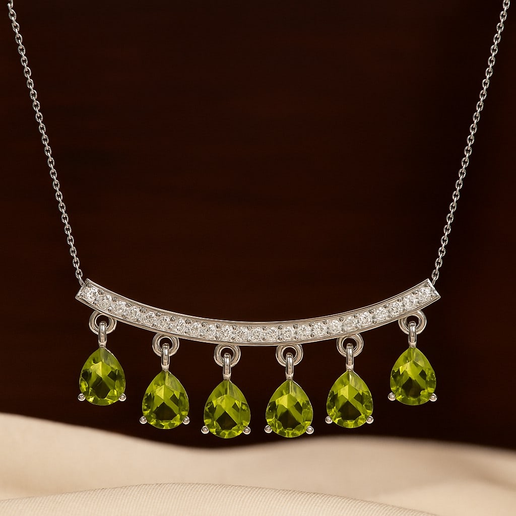 Natural Peridot & Diamond 92.5 Sterling Silver Necklace: Natural Peridot & Diamond 92.5 Sterling Silver Necklace Gemstone Shape : Pear Gemstone Size : 5x4 MM Gemstone Quantity : 6 Pieces Diamond Type : Lab Grown Diamond Shape : Round Diamond Color :