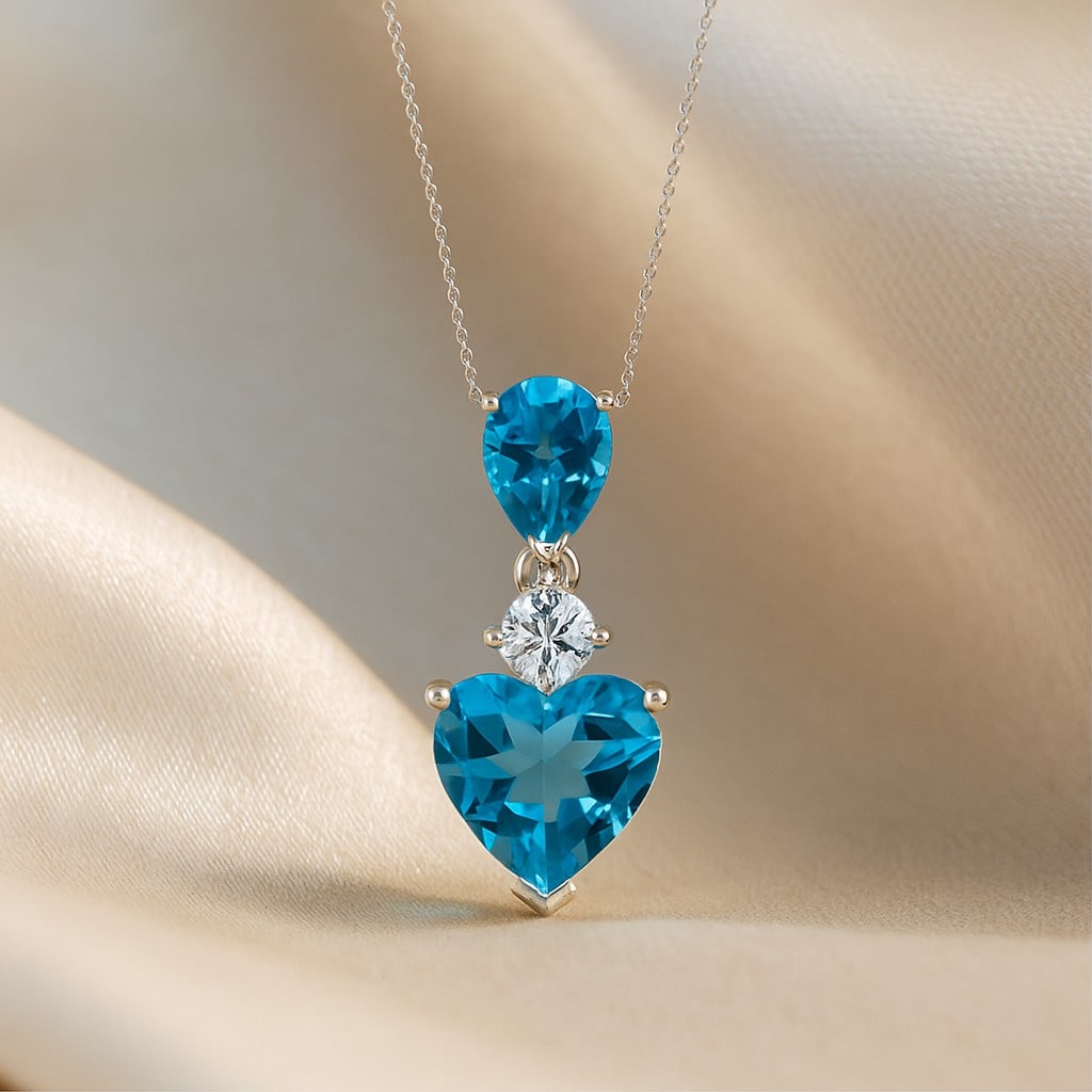Natural Swiss Blue Topaz & Diamond 92.5 Sterling Silver Pendant with Chain: Natural Swiss Blue Topaz & Diamond 92.5 Sterling Silver Pendant with Chain Gemstone Shape : Heart, Pear Gemstone Size : 9 MM, 7x5 MM Gemstone Quantity : 2 Pieces Diamond Type : Lab Grown Diamond Shape