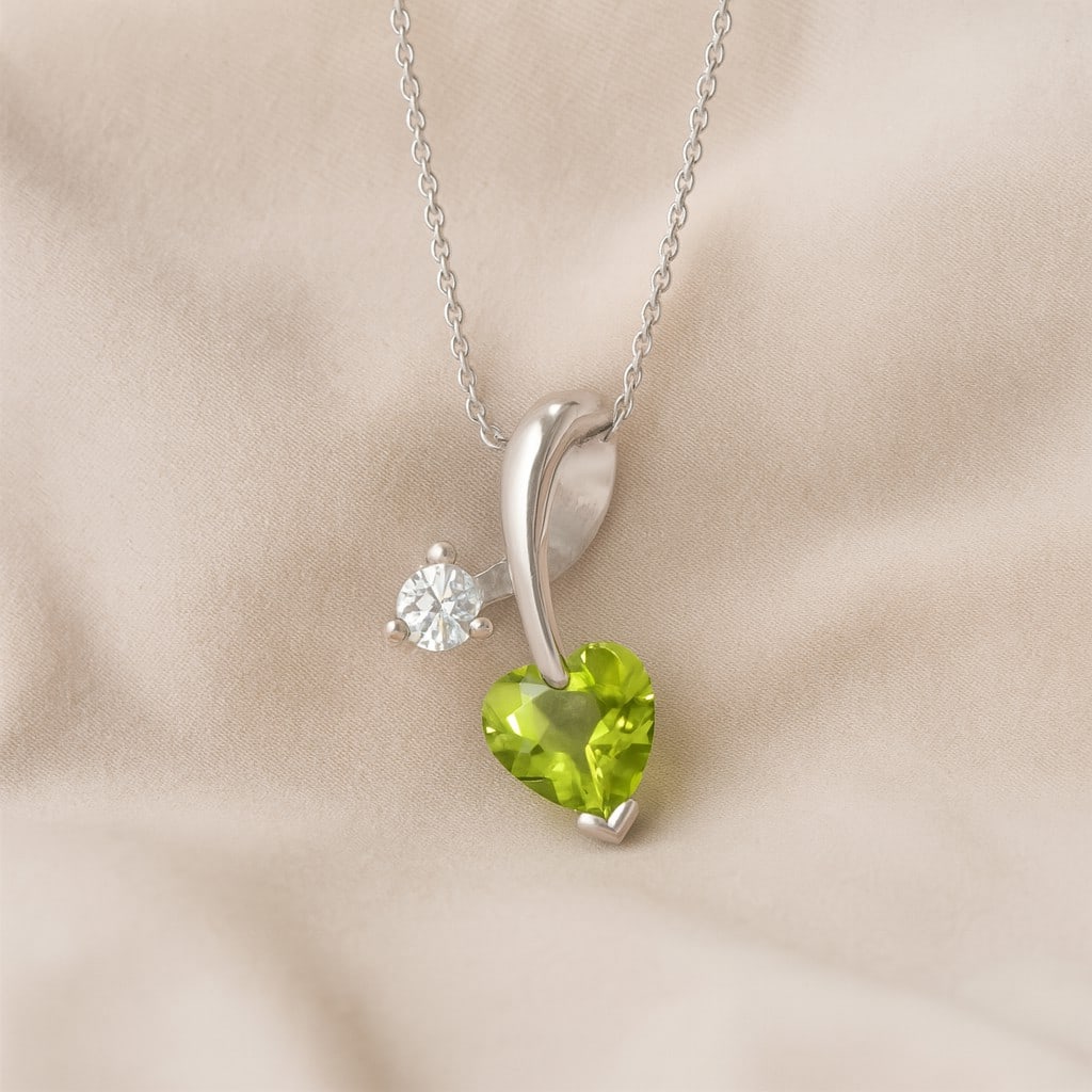 Natural Peridot & Diamond 92.5 Sterling Silver Pendant with Chain: Natural Peridot & Diamond 92.5 Sterling Silver Pendant with Chain Gemstone Shape : Heart Gemstone Size : 4 MM Gemstone Quantity : 1 Piece Diamond Type : Lab Grown Diamond Shape : Round Diamond