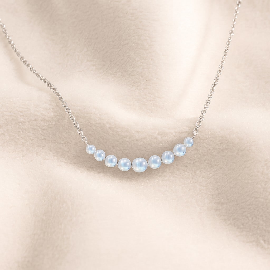 Natural Moonstone Gemstone 92.5 Sterling Silver Necklace: Natural Moonstone Gemstone 92.5 Sterling Silver Necklace Gemstone Shape : Round Gemstone Size : 3.5 - 6 MM Gemstone Quantity : 11 Pieces Metal : Silver Metal Purity : 92.5 Sterling Silver Penda
