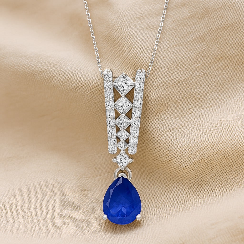 Natural Tanzanite & Diamond 92.5 Sterling Silver Pendant with Chain: Natural Tanzanite & Diamond 92.5 Sterling Silver Pendant with Chain Gemstone Shape : Pear Gemstone Size : 8x6 MM Gemstone Quantity : 1 Piece Diamond Type : Lab Grown Diamond Shape : Round Diamo