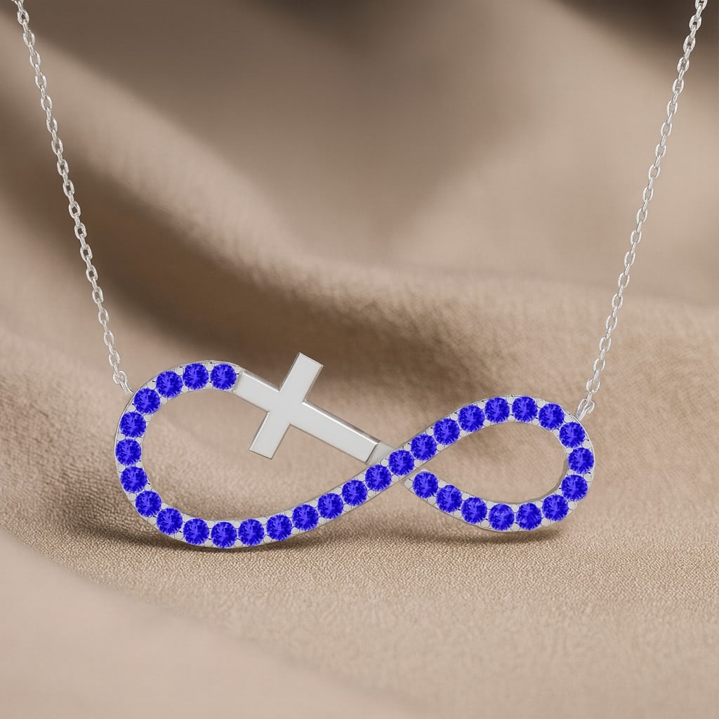 Natural Tanzanite Gemstone 92.5 Sterling Silver Necklace: Natural Tanzanite Gemstone 92.5 Sterling Silver Necklace Gemstone Shape : Round Gemstone Size : 1.3 MM Gemstone Quantity : 33 Pieces Metal : Silver Metal Purity : 92.5 Sterling Silver Pendant L