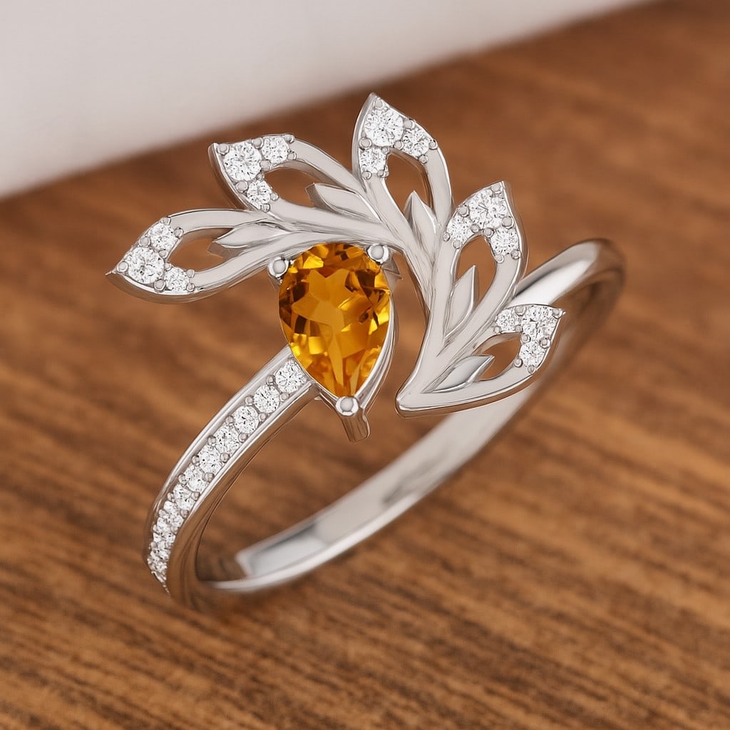 Natural Citrine Gemstone & Lab Grown Diamonds Silver Ring: Natural Citrine Gemstone & Lab Grown Diamonds Silver Ring Jewelry Type : Ring Gemstone : Natural Citrine Gemstone Shape : Pear Gemstone Size : 6x4 MM Gemstone Quantity : 1 Piece Diamond Type