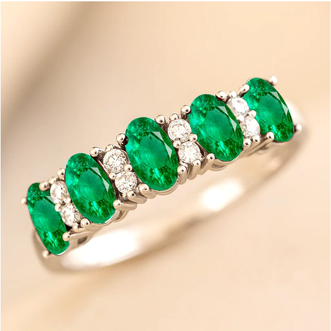 Lab Grown Emerald & Diamonds Silver Ring: Lab Grown Emerald & Diamonds Silver Ring Jewelry Type : Ring Gemstone : Lab Grown Emerald Gemstone Shape : Oval Gemstone Size : 5x3 MM Gemstone Quantity : 5 Pieces Diamond Type : Lab Grow