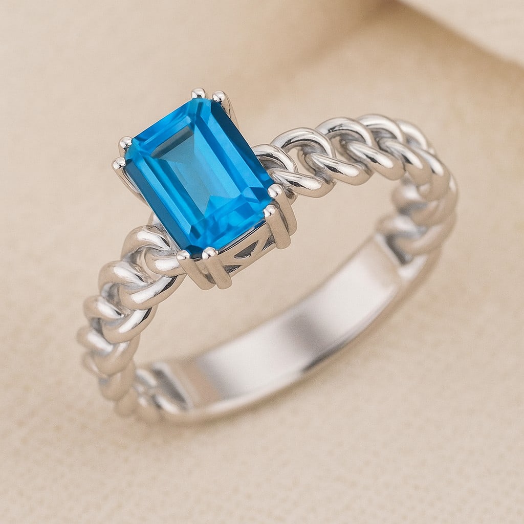 Natural Swiss Blue Topaz Gemstone 92.5 Sterling Silver Ring: Natural Swiss Blue Topaz Gemstone 92.5 Sterling Silver Ring Jewelry Type : Ring Gemstone : Natural Swiss Blue Topaz Gemstone Shape : Emerald Gemstone Size : 8x6 MM Gemstone Quantity : 1 Piece