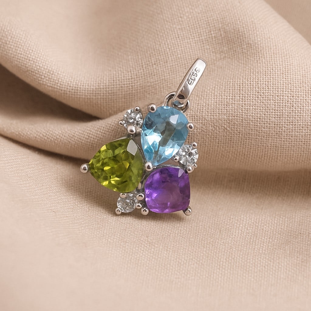 Natural Peridot, Amethyst & Topaz Gemstone 92.5 Sterling Silver Pendant: Natural Peridot, Amethyst & Topaz Gemstone 92.5 Sterling Silver Pendant Jewelry Type : Pendant Gemstone : Peridot, Topaz, Amethyst Gemstone Shape : Pear,Cushion,Trillion Gemstone Size : 6,5,7x5 MM Me