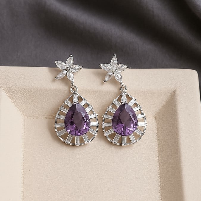 Natural Amethyst Gemstone 92.5 Sterling Silver Push Back Earring: Natural Amethyst Gemstone 92.5 Sterling Silver Push Back Earring Jewelry Type : Earring Gemstone : Amethyst Gemstone Shape : Pear Gemstone Size : 10x7 MM Metal : Sterling Silver Metal Purity