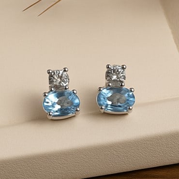 Natural Blue Topaz Gemstone 92.5 Sterling Silver Push Back Earring: Natural Blue Topaz Gemstone 92.5 Sterling Silver Push Back Earring Jewelry Type : Earring Gemstone : Blue Topaz Gemstone Shape : Oval Gemstone Size : 7x5 MM Metal : Sterling Silver Metal Pur