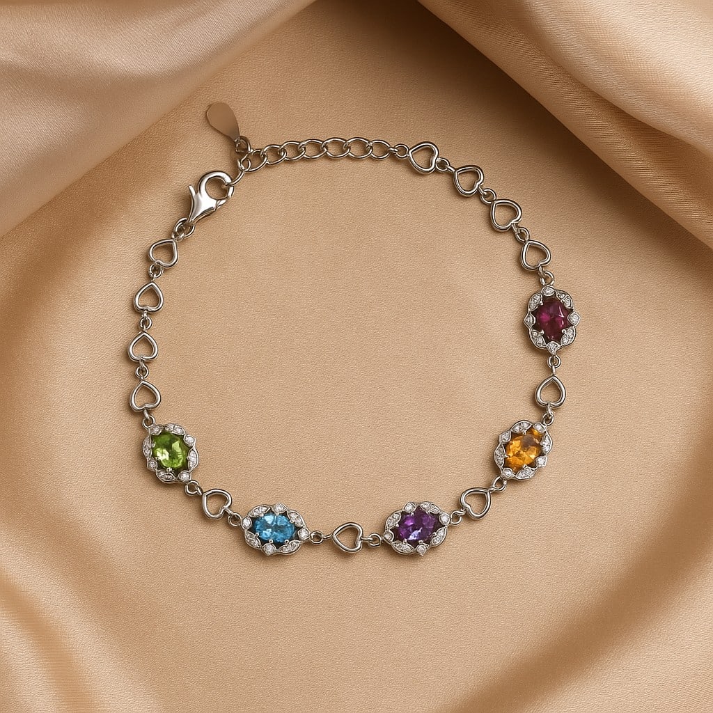 Natural Multi Gemstone 92.5 Sterling Silver Adjustable Bracelet: Natural Multi Gemstone 92.5 Sterling Silver Adjustable Bracelet Jewelry Type : Bracelet Gemstone : Peridot, Amethyst, Citrine, Topaz, Tourmaline Gemstone Shape : Oval Gemstone Size : 6x4 MM Metal :