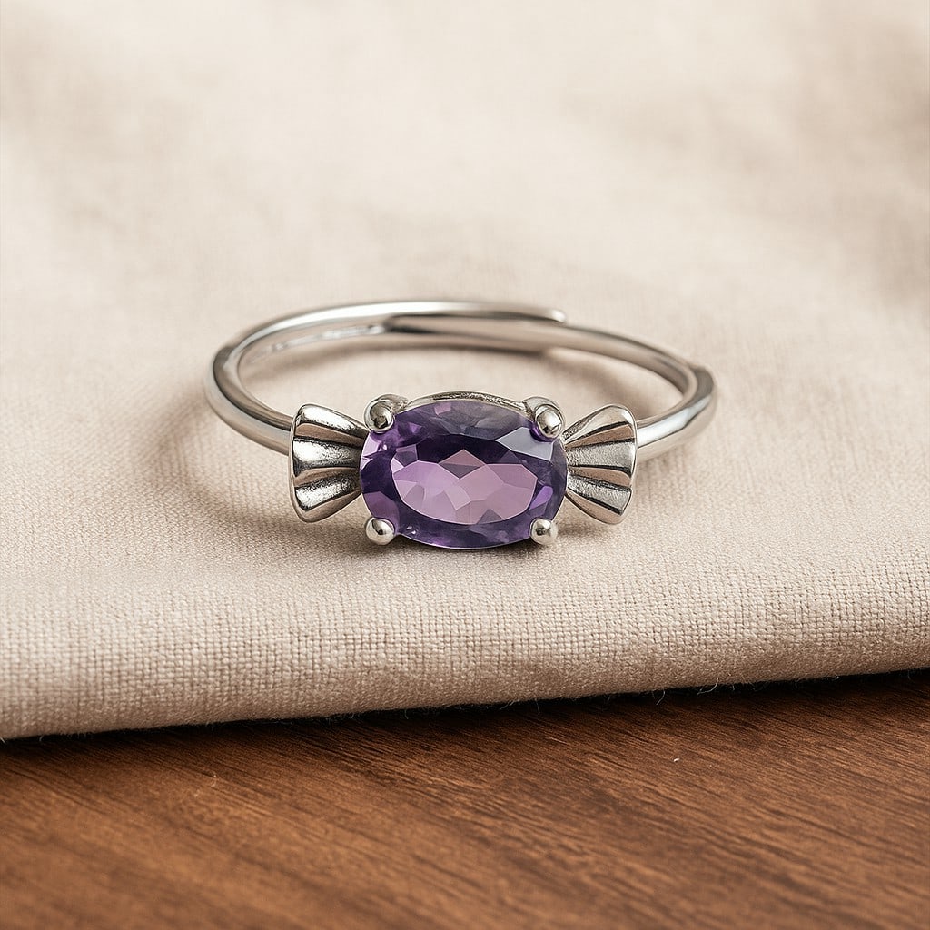 Natural Amethyst Gemstone 92.5 Sterling Silver Adjustable Ring: Natural Amethyst Gemstone 92.5 Sterling Silver Adjustable Ring Jewelry Type : Ring Gemstone : Amethyst Gemstone Shape : Oval Gemstone Size : 7x5 MM Metal : Sterling Silver Metal Purity :