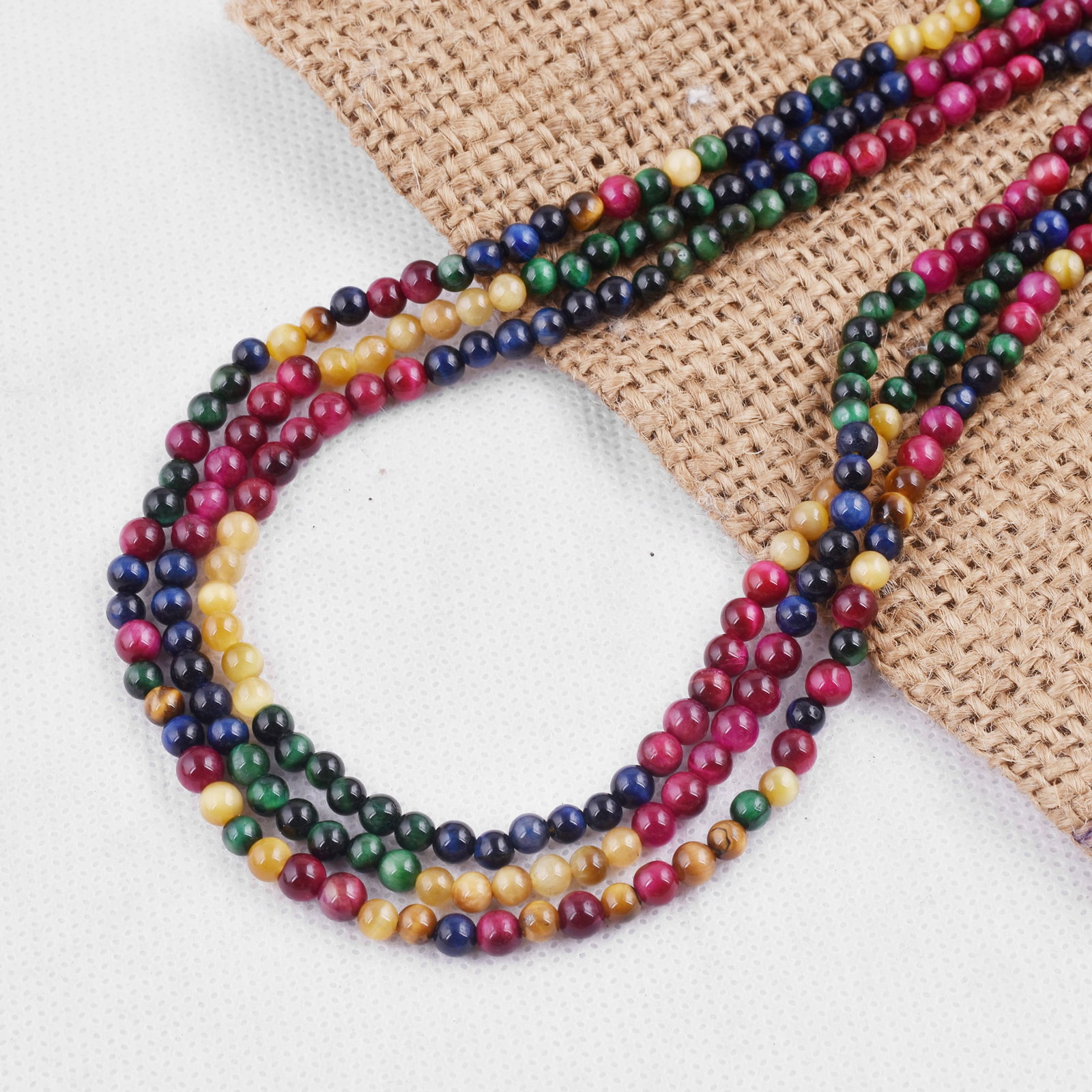 Natural Multi Tiger's Eye Necklace 4 MM Round Smooth 3 String Beads Gemstone: Natural Multi Tiger's Eye Gemstone 4 MM Round 3 Strings Smooth Beads Adjustable Necklace Product Type : Necklace Main Stone : Multi Tiger's Eye Main Stone Shape : Round Main Stone Size : 4 MM Beads Ty