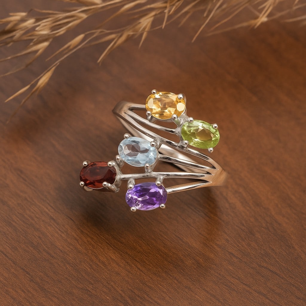 Natural Multi Gemstone 92.5 Sterling Silver Adjustable Ring: Natural Multi Gemstone 92.5 Sterling Silver Adjustable Ring Jewelry Type : Ring Gemstone : Citrine,Peridot,Aquamarine,Garnet,Amethyst Gemstone Shape : Oval Gemstone Size : 6x4 MM Metal : Sterling S