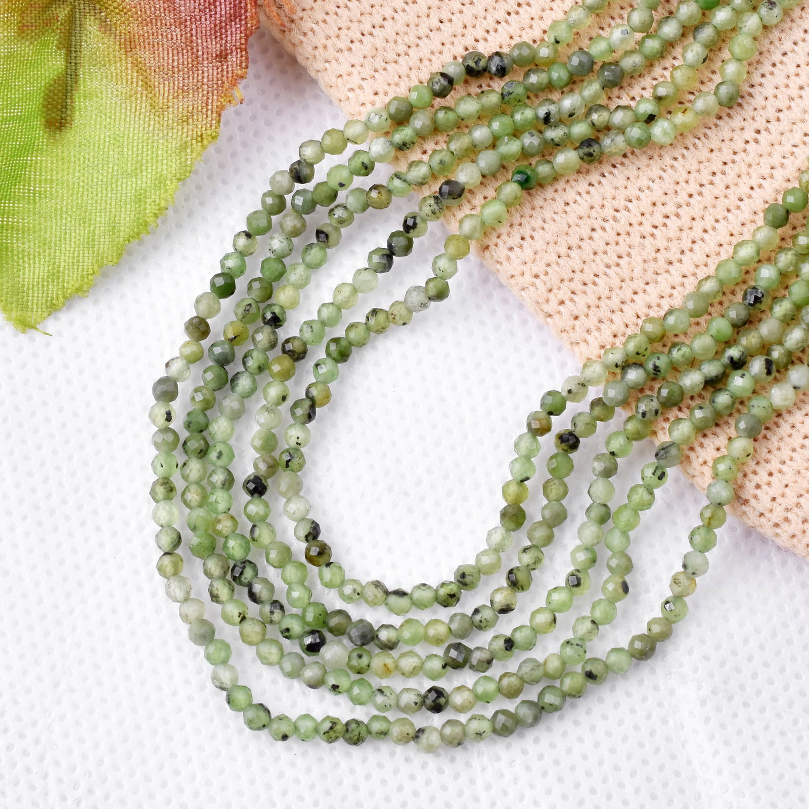 Natural Canadian Jade 2 MM Round Faceted 5 String Beads Necklace: Natural Canadian Jade 2 MM Round Faceted 5 String Beads Necklace Product Type : Necklace Main Stone : Canadian Jade Main Stone Shape : Round Main Stone Size : 2 MM Beads Type : Faceted Closu