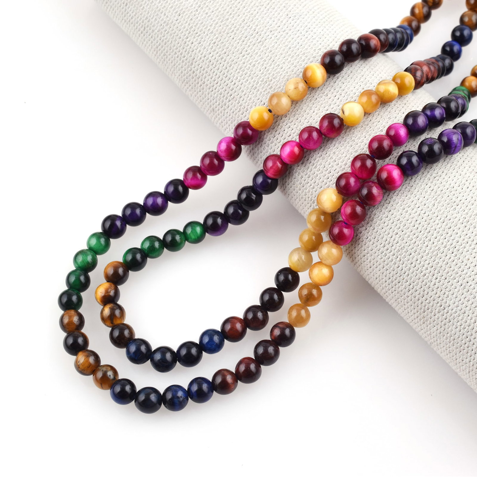 Natural Multi Tiger's Eye Necklace 6 MM Round Smooth 2 String Beads Gemstone: Natural Multi Tiger's Eye Gemstone 6 MM Round 2 Strings Smooth Beads Adjustable Necklace Product Type : Necklace Main Stone : Multi Tiger's Eye Main Stone Shape : Round Main Stone Size : 6 MM Beads Ty