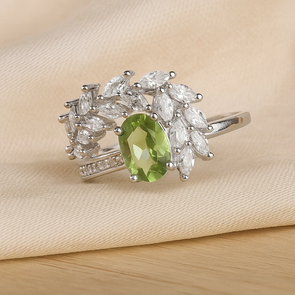 Natural Peridot Gemstone 92.5 Sterling Silver Adjustable Ring: Natural Peridot Gemstone 92.5 Sterling Silver Adjustable Ring Jewelry Type : Ring Gemstone : Peridot Gemstone Shape : Oval Gemstone Size : 7x5 MM Metal : Sterling Silver Metal Purity : 9
