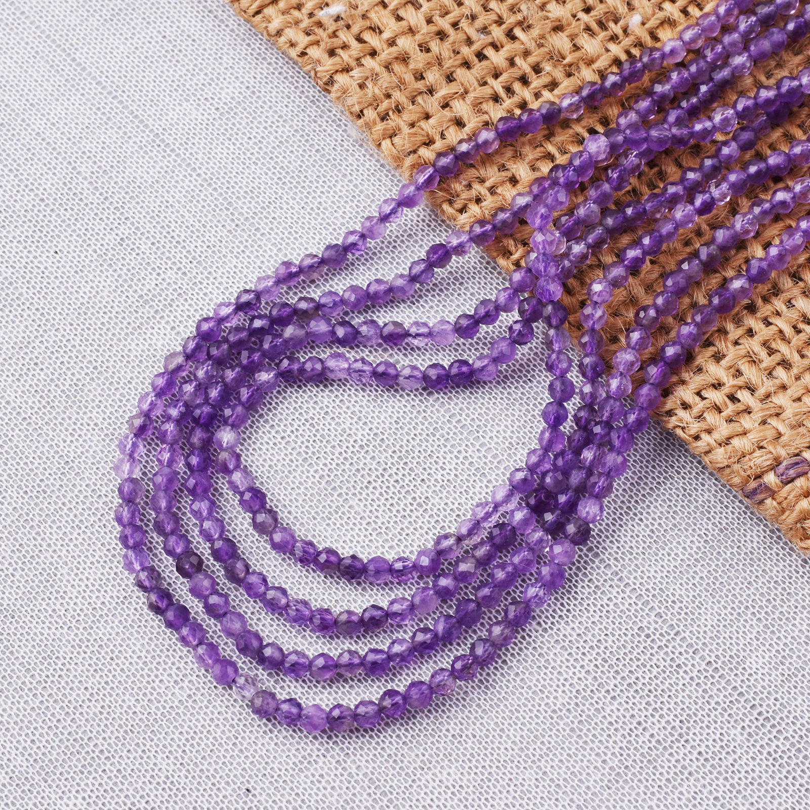 Natural Amethyst 3 MM Round Faceted 4 String Beads Necklace: Natural Amethyst 3 MM Round Faceted 4 String Beads Necklace Product Type : Necklace Main Stone : Amethyst Main Stone Shape : Round Main Stone Size : 3 MM Beads Type : Faceted Closure Type :