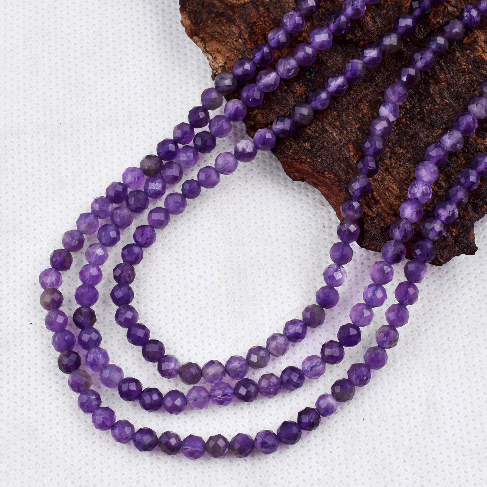 Natural Amethyst Necklace 4 MM Round Faceted 3 String Beads Gemstone: Natural Amethyst Gemstone 4 MM Round 3 Strings Faceted Beads Adjustable Necklace Product Type : Necklace Main Stone : Amethyst Main Stone Shape : Round Main Stone Size : 4 MM Beads Type : Faceted</