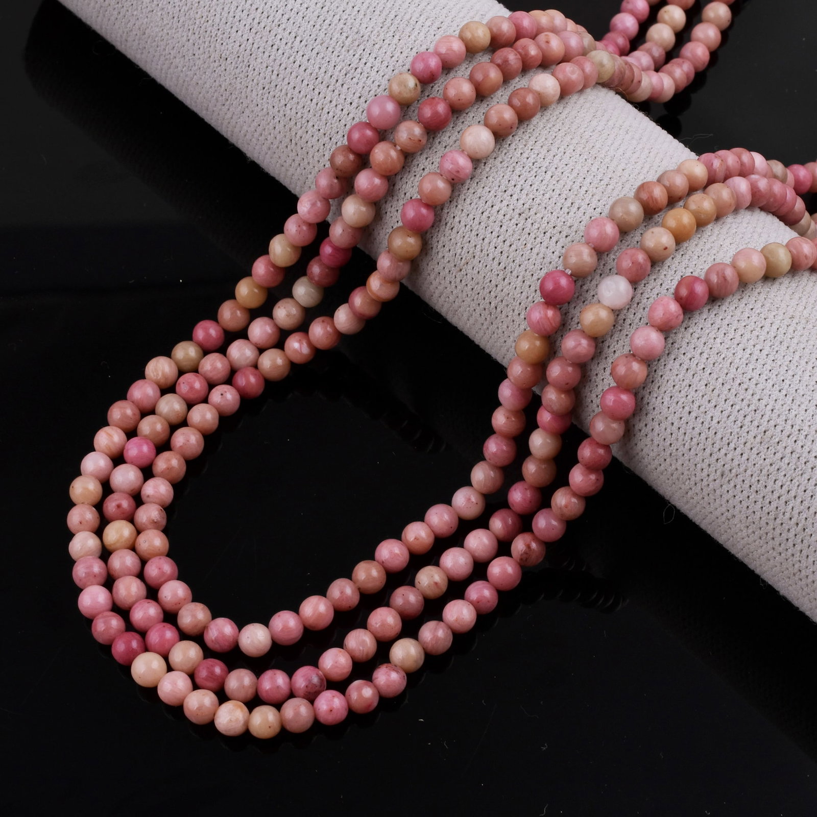 Natural Rhodonite Necklace 4 MM Round Smooth 3 String Beads Gemstone: Natural Rhodonite Gemstone 4 MM Round 3 Strings Smooth Beads Adjustable Necklace Product Type : Necklace Main Stone : Rhodonite Main Stone Shape : Round Main Stone Size : 4 MM Beads Type : Smooth</