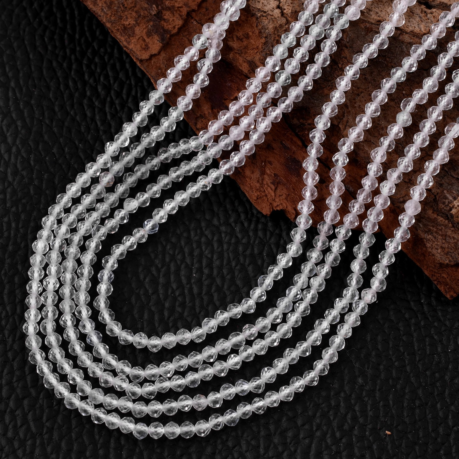 Natural White Topaz 2 MM Round Faceted 5 String Beads Necklace: Natural White Topaz 2 MM Round Faceted 5 String Beads Necklace Product Type : Necklace Main Stone : White Topaz Main Stone Shape : Round Main Stone Size : 2 MM Beads Type : Faceted Closure T