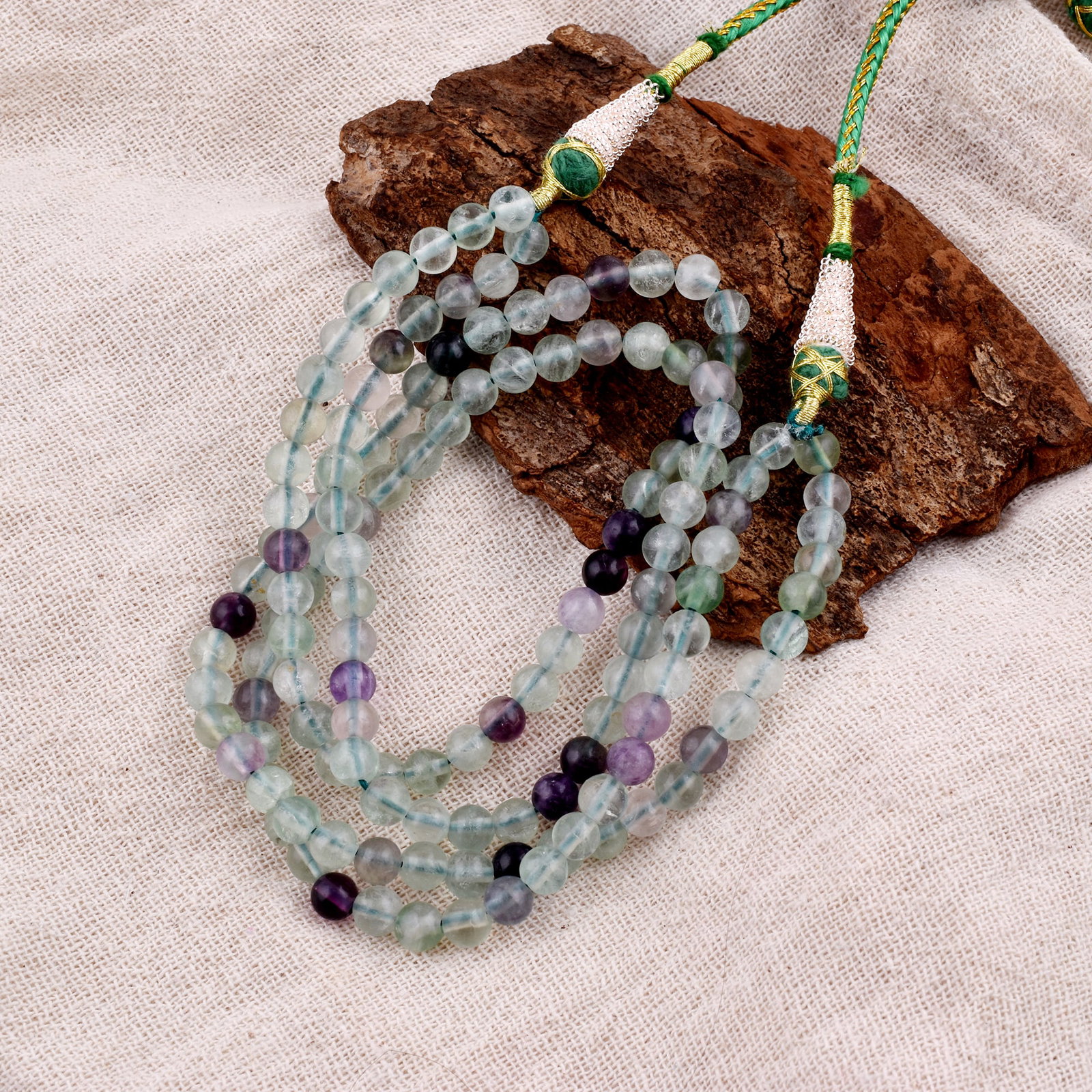 Natural Fluorite Necklace 6 MM Round Smooth 2 String Beads Gemstone: Natural Fluorite Gemstone 6 MM Round 2 Strings Smooth Beads Adjustable Necklace Product Type : Necklace Main Stone : Fluorite Main Stone Shape : Round Main Stone Size : 6 MM Beads Type : Smooth</