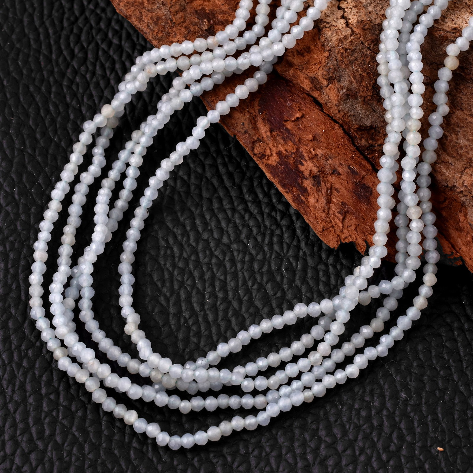 Natural Angelite 2 MM Round Faceted 5 String Beads Necklace: Natural Angelite 2 MM Round Faceted 5 String Beads Necklace Product Type : Necklace Main Stone : Angelite Main Stone Shape : Round Main Stone Size : 2 MM Beads Type : Faceted Closure Type :