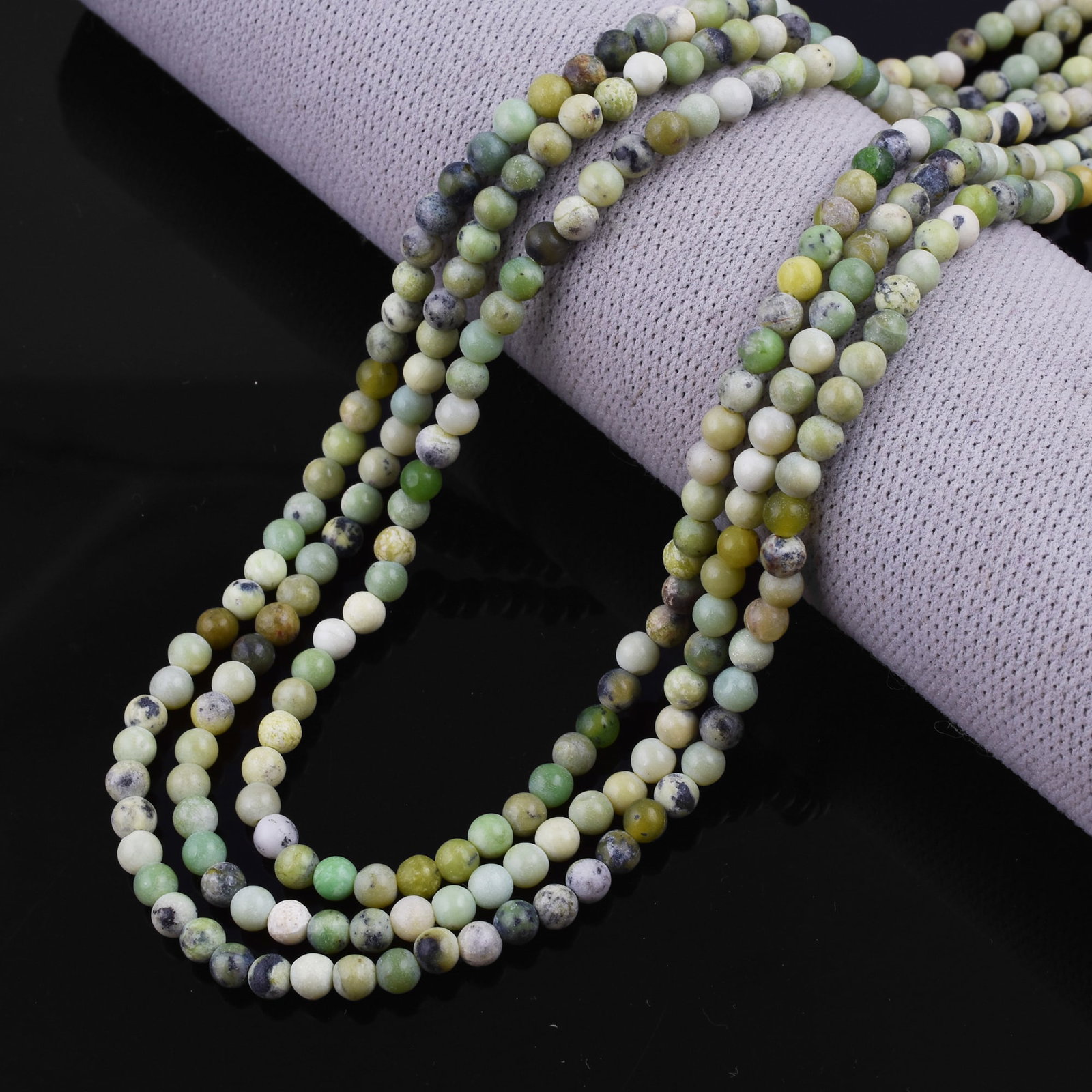 Natural Chrysoprase Necklace 4 MM Round Smooth 3 String Beads Gemstone: Natural Chrysoprase Gemstone 4 MM Round 3 Strings Smooth Beads Adjustable Necklace Product Type : Necklace Main Stone : Chrysoprase Main Stone Shape : Round Main Stone Size : 4 MM Beads Type : Smoo