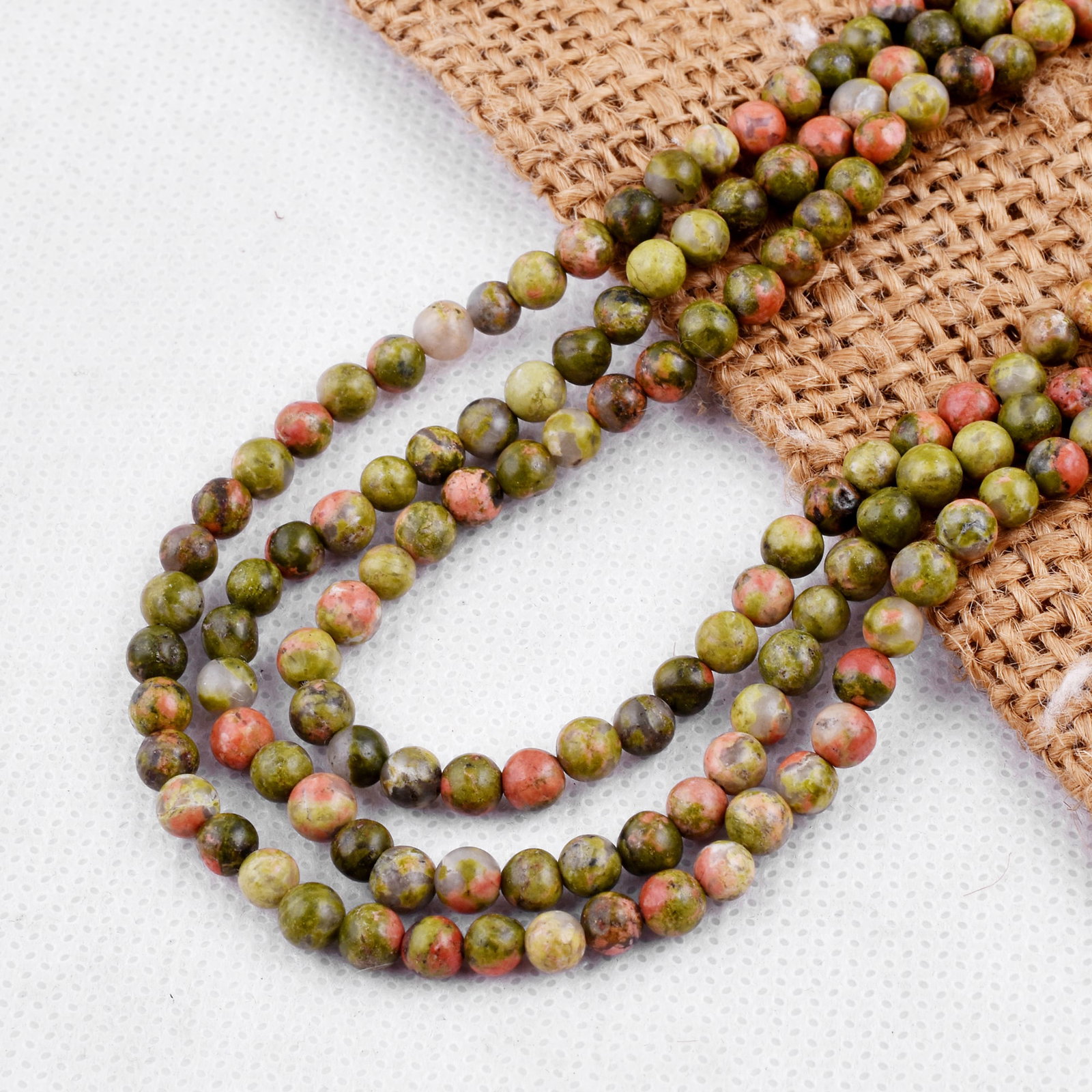 Natural Unakite Necklace 4 MM Round Smooth 3 String Beads Gemstone: Natural Unakite Gemstone 4 MM Round 3 Strings Smooth Beads Adjustable Necklace Product Type : Necklace Main Stone : Unakite Main Stone Shape : Round Main Stone Size : 4 MM Beads Type : Smooth