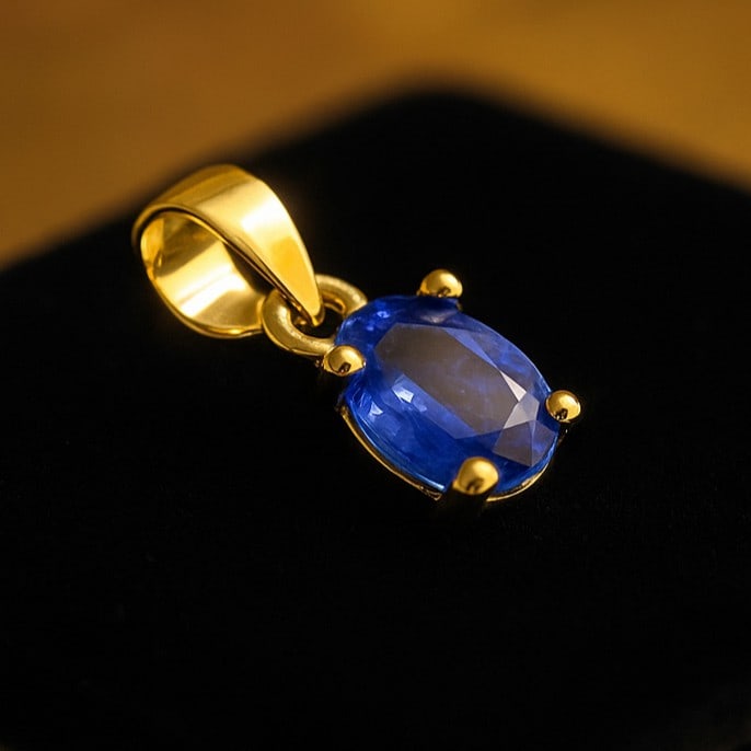 NATURAL TANZANITE GEMSTONE 14KT YELLOW GOLD HANDMADE PENDANT JEWELRY: NATURAL TANZANITE GEMSTONE 14KT YELLOW GOLD HANDMADE PENDANT JEWELRY GEMSTONE : TANZANITE STONE SHAPE : OVAL STONE SIZE : 7X5 MM STONE WEIGHT : 0.95 CTS METAL : YELLOW GOLD METAL PURITY : 14 KT<